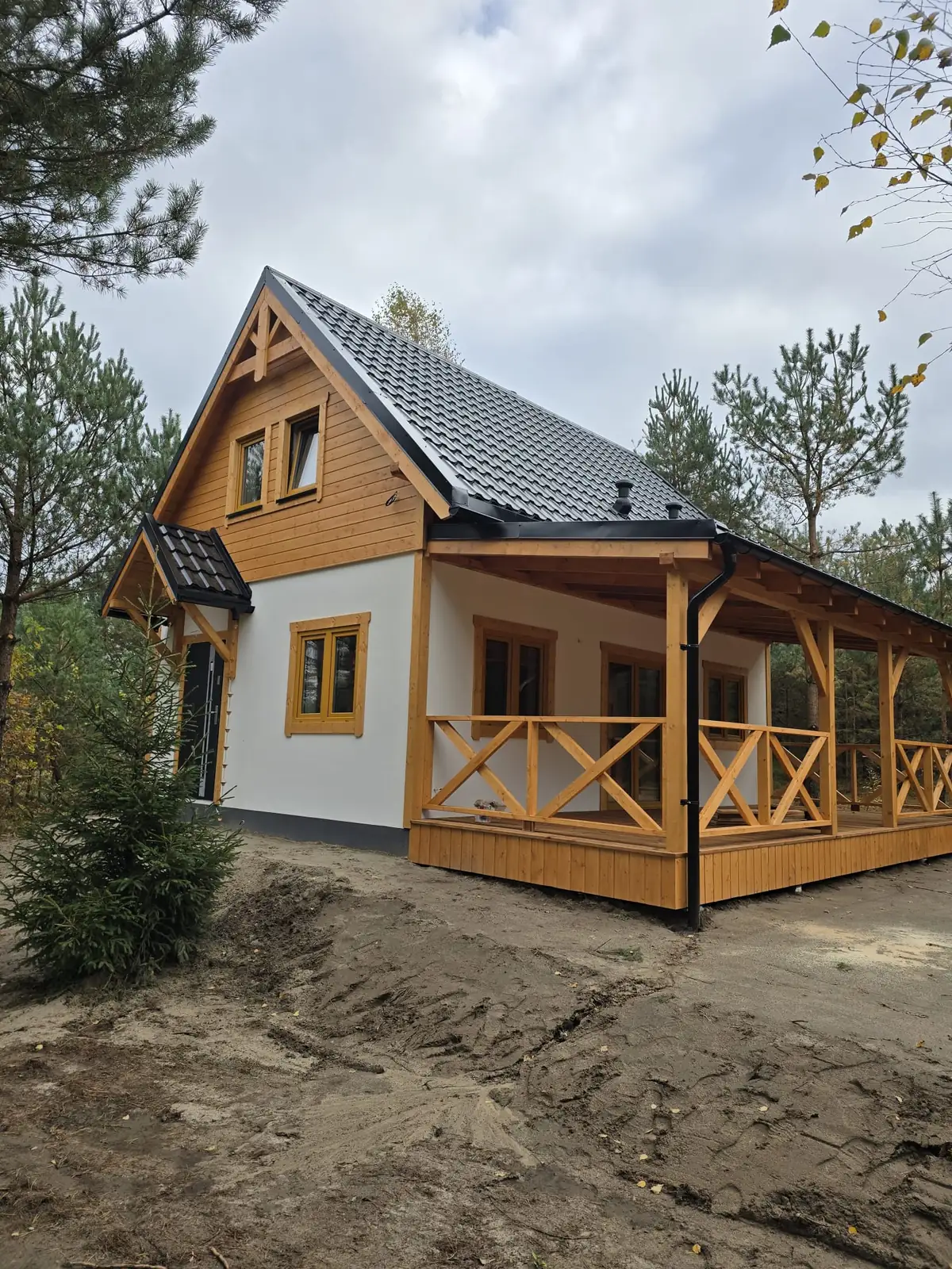 Weranda domu drewnianego 83 m² z balustradą